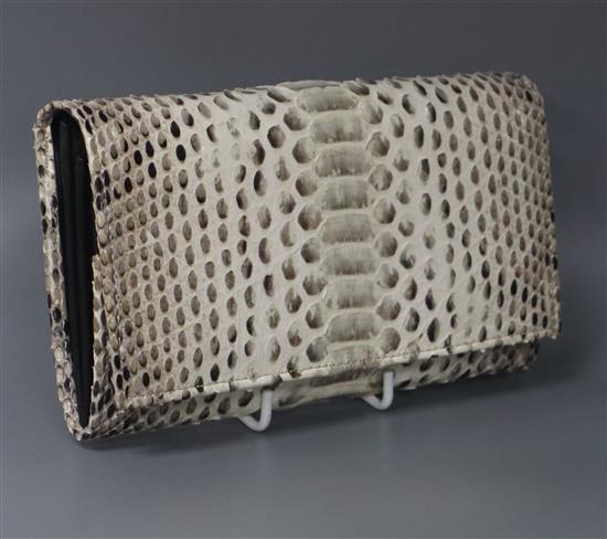 A Silvano Biagini snakeskin and leather clutch bag